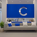 Modern Lounge Area With Comfortable Sofa Green Plants And Glass Partitions
