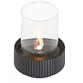 Modern Fireplace With Transparent Glass Enclosure And Burning Flame On Black Ribbed Base
