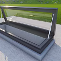 Residential Building With Glass Skylight Overlooking Green Grassland And Mountain Range