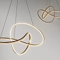 Modern Geometric Chandelier With Intertwined Gold Metal Rings And LED Light Strips