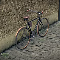 Classic Vintage Bicycle Leaning Against Old Brick Wall On Cobblestone Path 3d model