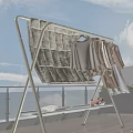 Home Balcony With Clothes Drying Rack Cartoon Patterned Quilt Stuffed Toy Under Blue Sky