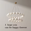 Modern Minimalist Chandelier With White Spheres And Gold Accents For Elegant Lighting