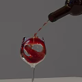 Red Wine Being Poured from Wine Bottle into Elegant Wine Glass