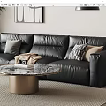 Black Leather Sofa With Pillows Throw Blanket And Marble Coffee Table In Modern Living Room
