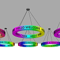 Colorful Circular Chandeliers With Welcome Hello Text And String Light Design