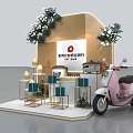 Modern Display Booth with Gift Boxes Pink Scooter and Greenery Decorations