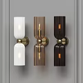 Three Modern Wall Lamps With Ribbed Glass Shades And Brass Bases On Grey Wall