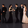 Group of People in Formal Attire Holding Champagne Glasses at Elegant Event