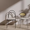 Modern Dining Chairs With Unique Backrest Designs And Neutral Seats 3d model