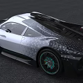 Silver Sports Car With Sleek Design Rear Spoiler Black Accents And Green Alloy Wheels