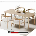 Modern Minimalist Dining Table With Four Light Wooden Chairs And Decorative Pieces On Beige Rug