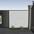 Modern Garden Feature Wall With Textured Stone Black Slatted Panels And Lush Plants