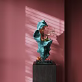Artistic Blue Green Sculpture with Intricate Carving Floral Decor and Fruit on Black Wooden Base