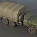 Green Military Truck With Canvas Cargo Cover And Six Wheels Design