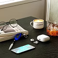 Decorative Ornament Set With Glasses Books Pen Smartphone White Earbuds Coffee Mug And Glass