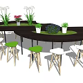 Modern Bar Counter Design With Green Plants Decorations And Colorful Stools