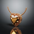 Golden Heart Shaped Pendant Necklace With Intricate Design And Shiny Chain For Fashion
