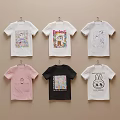 Stylish T-shirts with Various Designs and Colors Hanging on Wall