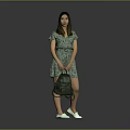 A Woman In Green Floral Dress Holding Green Bag With White Shoes Against Gray Background