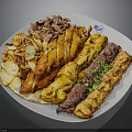 Assorted Grilled Meats And Chicken Skewers Served On White Plate With Sides