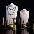 Fashionable Jewelry Collection With Necklaces Earrings Ring On Mannequins And Stands