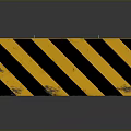 Yellow And Black Striped Traffic Barrier On Gray Surface With Reflection