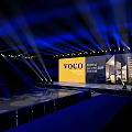 Grand voco Hotel Launch Event Stage With Backdrop Screen Architectural Images And Blue Lighting