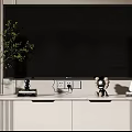 Modern White TV Stand With Green Plant Vase Decorative Sculptures And Storage Drawers