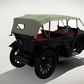 Vintage Classic Car With Soft Top Red Seats And Gold Front Grille