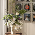 Bonsai Potted Plant with Mixed White Purple Blue Flowers and Black Vinyl Records Wall Decor