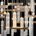 Modern Transparent Cylindrical Chandelier With Gold Metal Frame And Hanging Light Bars