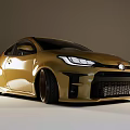 Golden Toyota Sporty Hatchback With Black Grille And Alloy Wheels