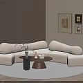 Curved Beige Sofa and Coffee Table Set with Decorative Paintings Round Rug and Striped Wall