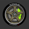 Car Wheel With ADVAN Brand Golden Rim And Green Brake Caliper Design