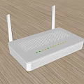 White Wireless Router With Dual Antennas And Indicator Lights On Wooden Surface