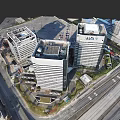 Aerial View of Modern Urban High Rise Buildings with Surrounding Roads and Parking Area