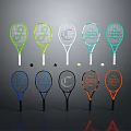 Colorful Tennis Rackets with Various Designs and Tennis Balls on