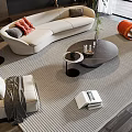 Modern Cream Curved Sofa and Round Coffee Table Set with Gray Carpet and Orange Armchairs