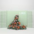 Floral Installation With Orange Pink Flowers Against Light Green Background Flanked By White Grid Screens