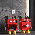 Red Robot Shaped Mickey Mouse Dolls With Card Extended Hand Yellow Feet And Gray Wall