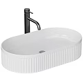 Stylish White Fluted Vessel Washbasin Features Ceramic Build And Black Faucet