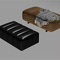Black Leather Ottoman And Brown Chevron Patterned Ottoman With Gray Striped Blanket