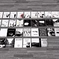 Various Books And Magazines Displayed On Wooden Floor With Different Covers