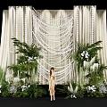 Elegant Wedding Decoration With White Drapes Hanging Ornaments Green Plants And Flowers