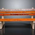 Rustic Wooden Bench With Baltimore And The Greatest City In America Inscriptions And Concrete Legs