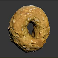 Freshly Baked Golden Sesame Seed Bagel With Shiny Surface On Dark Background