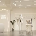 Modern Clothing Store Interior With White Reception Desk Clothing Racks Mannequin And Green Plants
