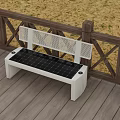 Solar Powered Outdoor Bench On Wooden Deck With Railing Sandy Ground And Green Plants