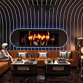 Modern KTV Lounge With Orange Sofa Coffee Tables Screen Decorative Lights And Astronaut Model